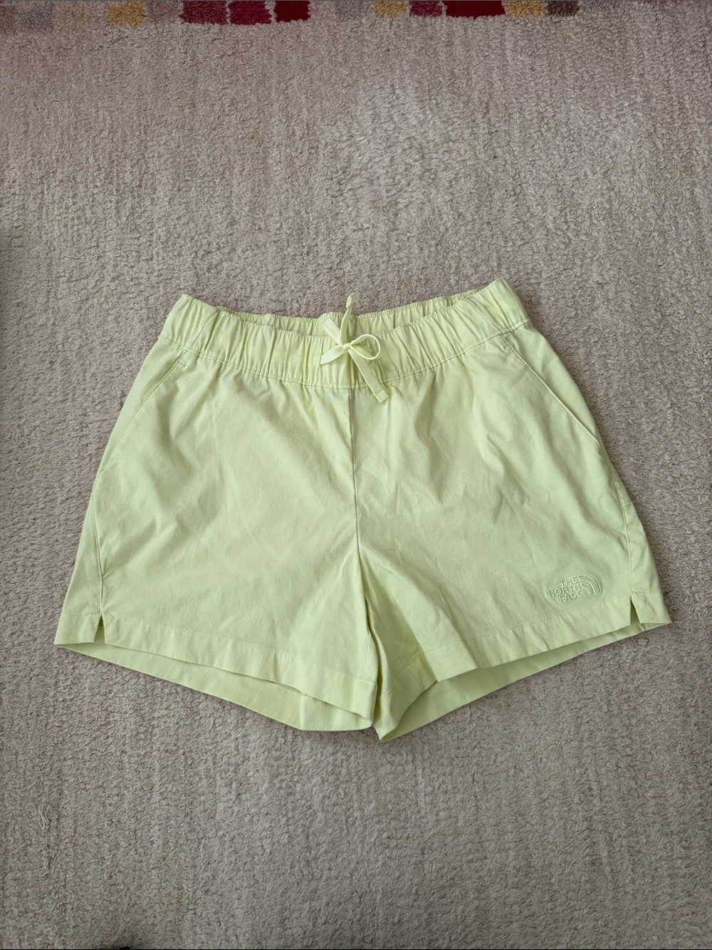 The North Face Women's Pale Yellow Drawstring Athletic Shorts a size Small